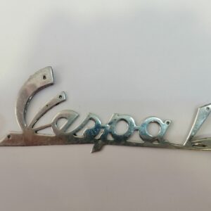 Emblema/anagrama Vespa L cromado.