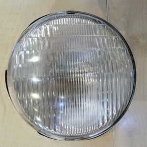 Óptica faro moto clásica.