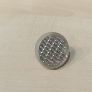Catadrióptico/reflectante blanco con tornillo.